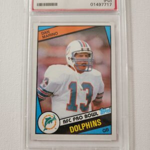 A football card that is in its holder.