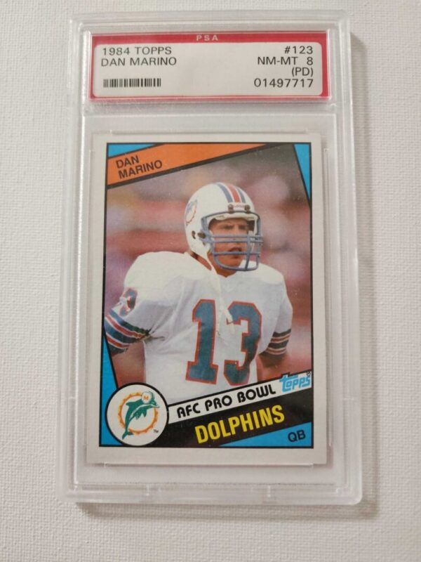 A football card that is in its holder.