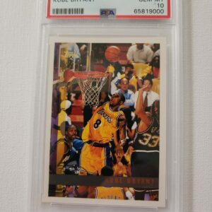A basketball card is shown in front of many other cards.