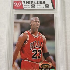 A basketball card is shown in its holder.