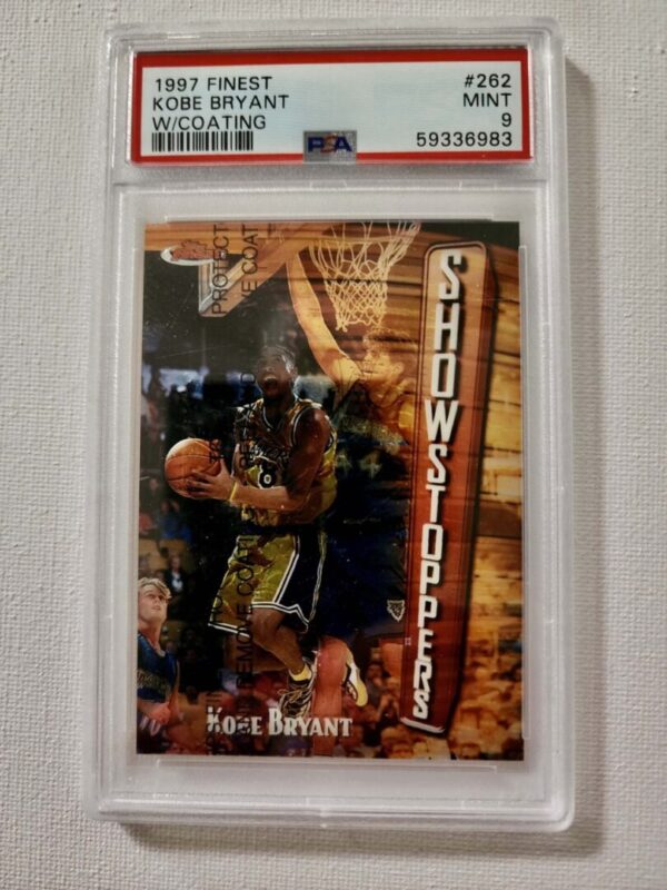 A basketball card is shown in its protective case.