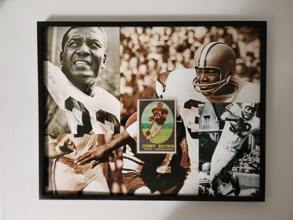 A framed photo of an african american football player.