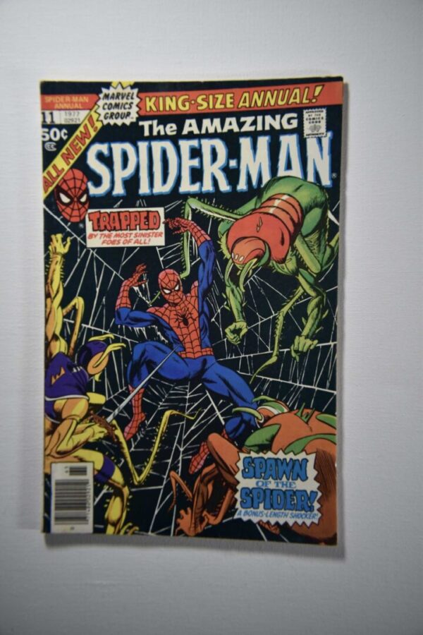 A comic book cover with spider-man and other characters.