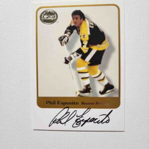 A hockey card with the name of phil esposito