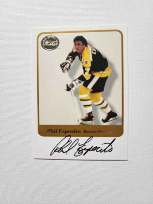 A hockey card with the name of phil esposito