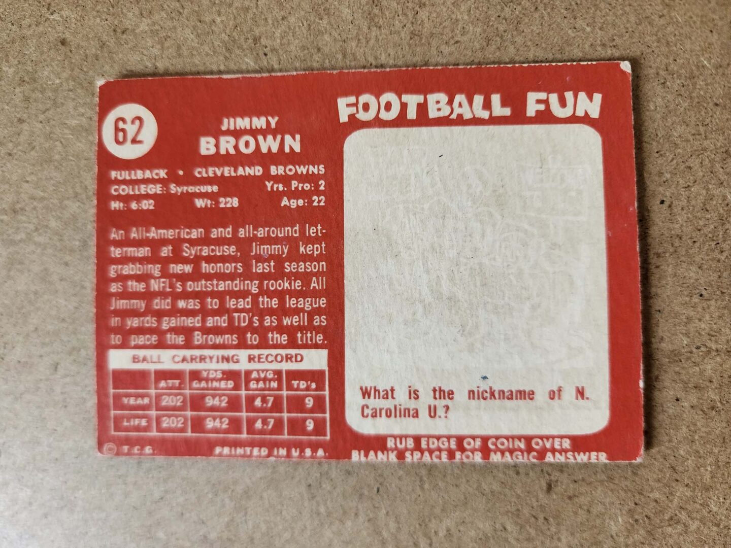 A red and white football card with the number 6 2.