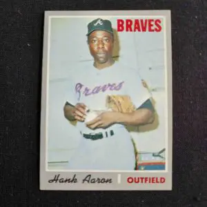 A baseball card of hank aaron with the braves on it.