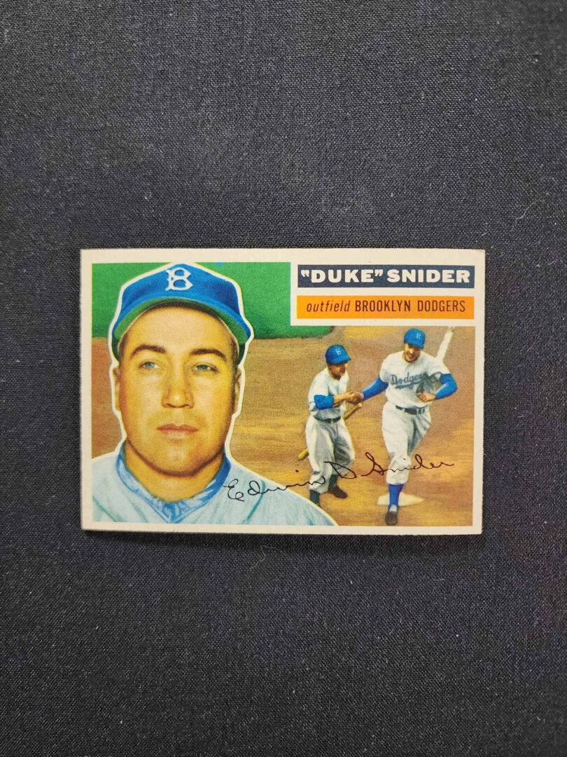 A baseball card of duke snider with the number 1 5 on it.