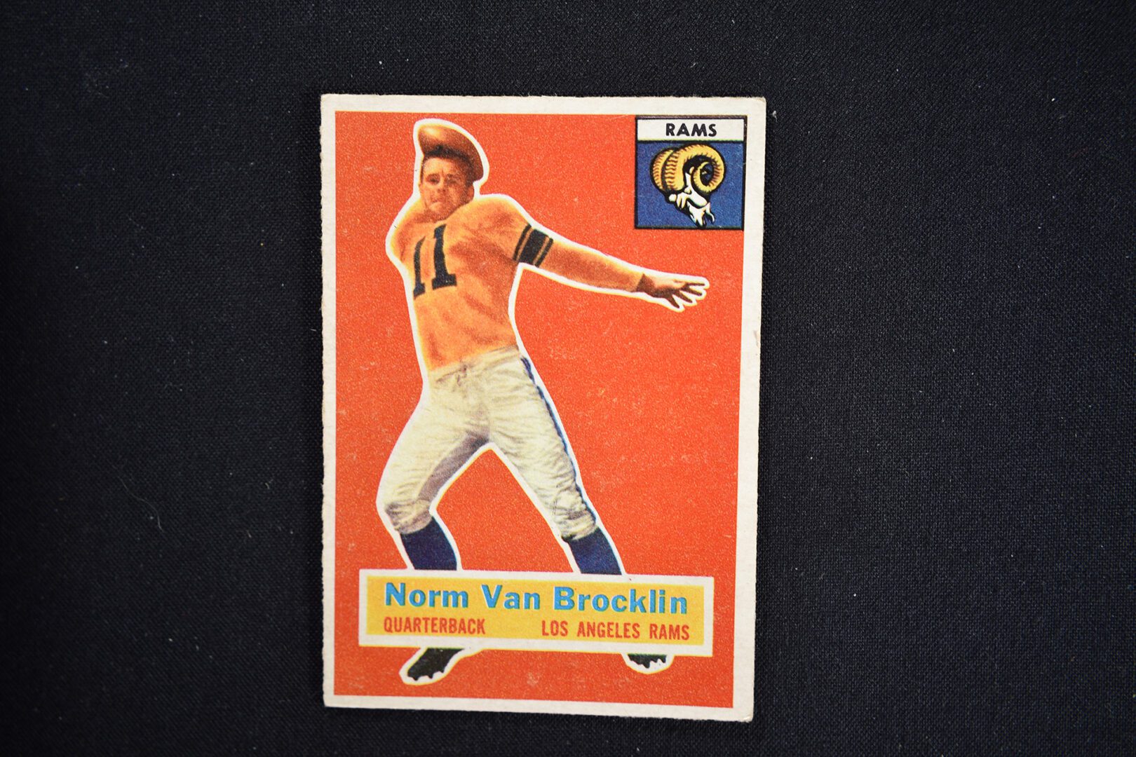 A card of a football player with the number 1 1.