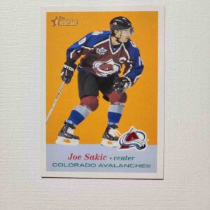 A hockey card with the name of joe sakic