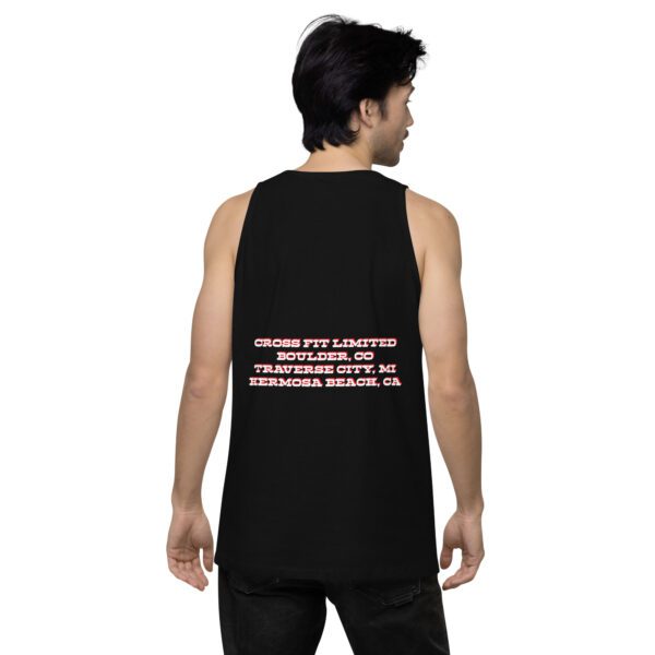 A man wearing a black tank top with the words " fresno fire limited, sacramento, ca."