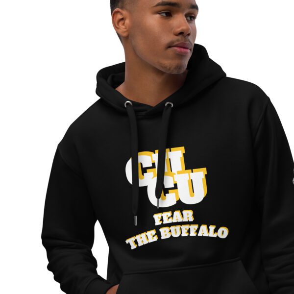 A man in black hoodie with yellow letters on it.