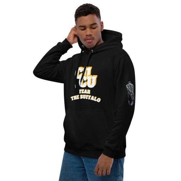 A man in black hoodie with yellow lettering