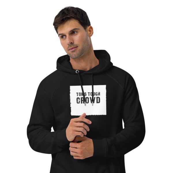 A man wearing a black hoodie with the words " turn your crowd ".