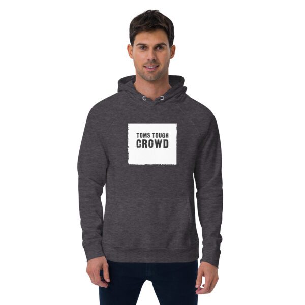 A man wearing a dark grey hoodie with the words " turn your crowd ".