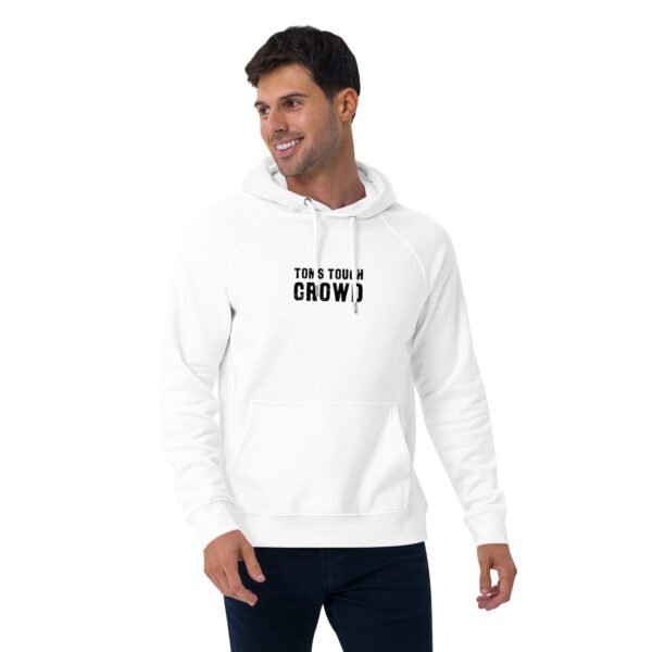 A man wearing a white hoodie with the words " grow ".