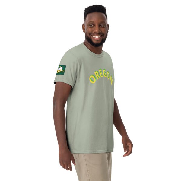 A man wearing a t-shirt with the word oregon on it.