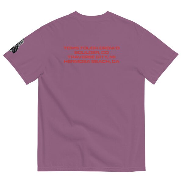 A purple t-shirt with the words " don 't be afraid to speak " written on it.