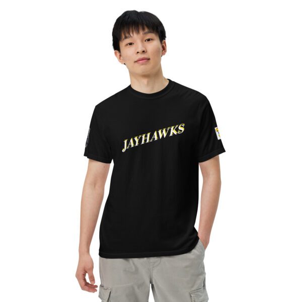 A man wearing a black shirt with the words " jayhawks ".