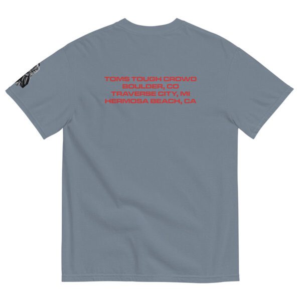 A gray t-shirt with red writing on it.