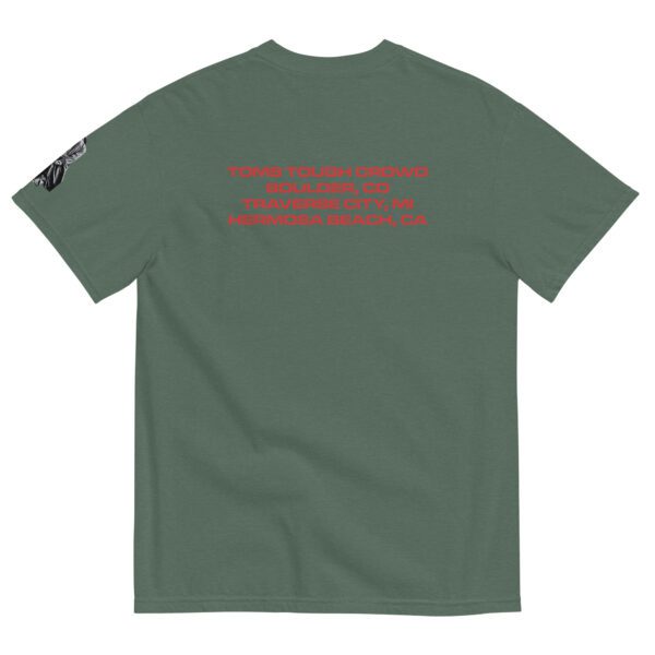 A green t-shirt with red writing on it.