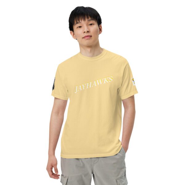 A man wearing a yellow t-shirt with the word " universe ".