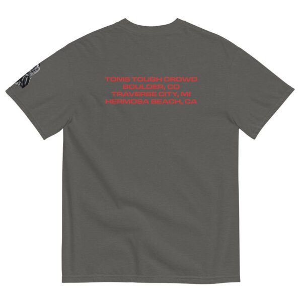 A gray t-shirt with red writing on it.