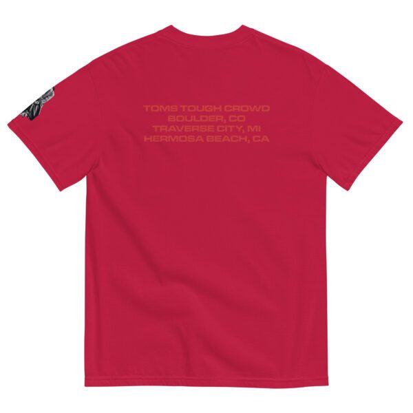 A red t-shirt with the words " we are all different people ".