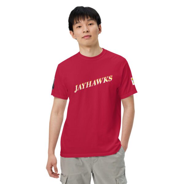 A man wearing a red shirt with the words " javilooks ".