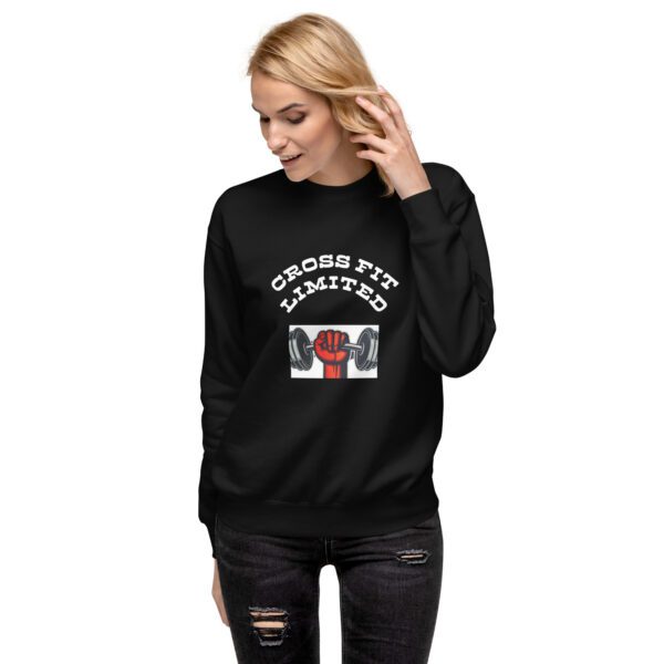 A woman wearing a black sweatshirt with cross fit limited on it.