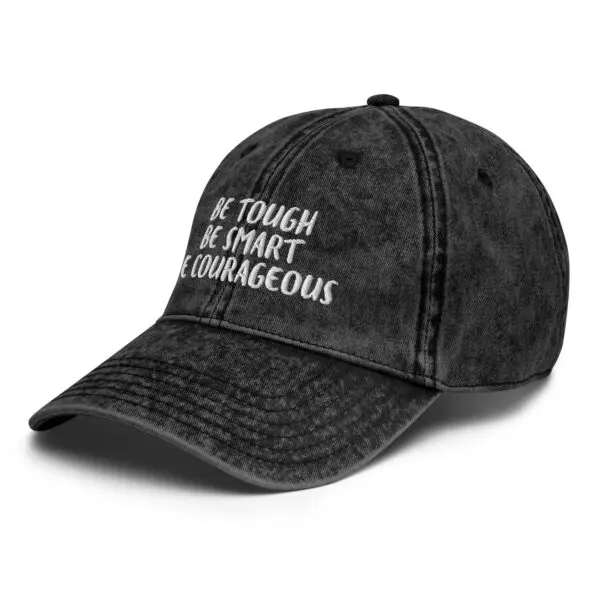 A black hat with the words " be tough, be smart, courageous ".