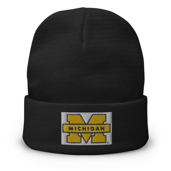 A black beanie with the university of michigan logo.