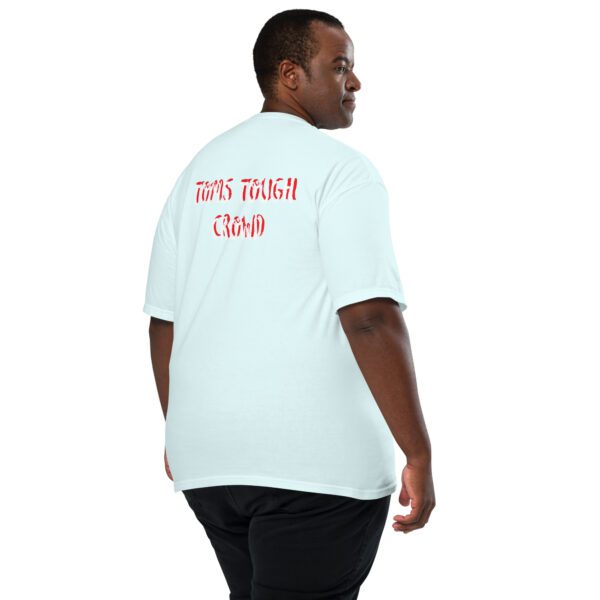 A man wearing a white t-shirt with the words " guys always crush."