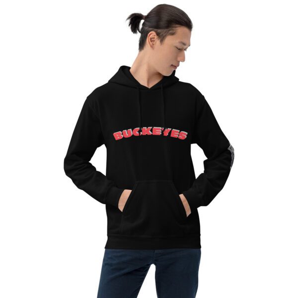 A man in black hoodie with red lettering