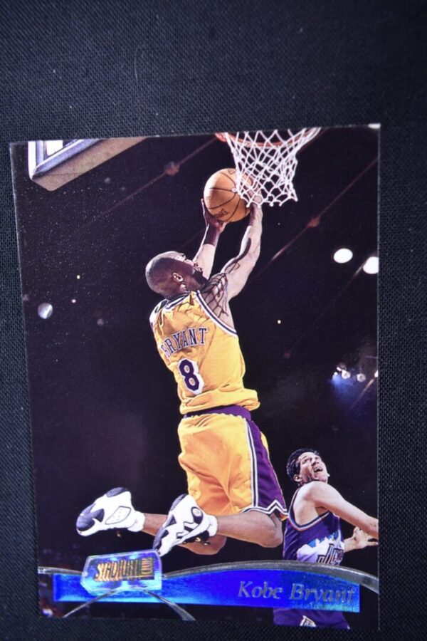 Kobe Bryant basketball card, slam dunk.