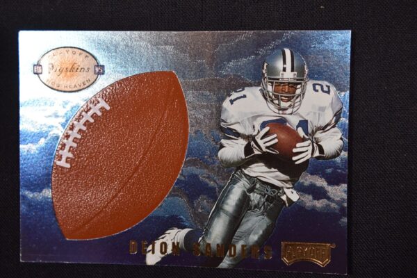 Deion Sanders football card with leather football.