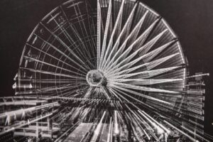 Black and white photo of a Ferris wheel.