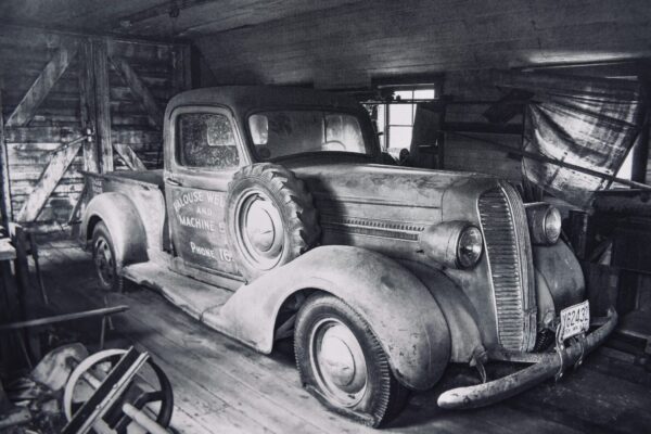 Black and white photo of a vintage truck.