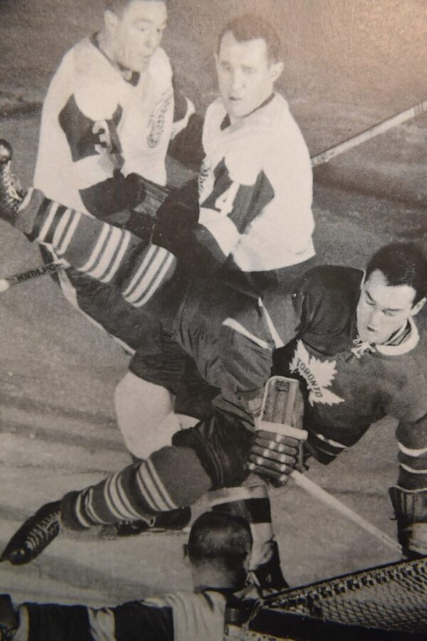 Hockey players in a game action shot.