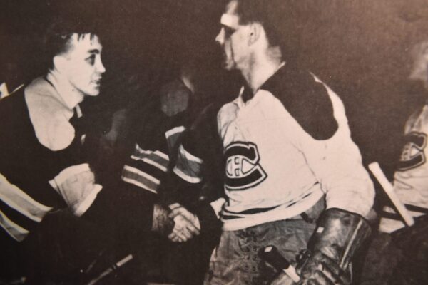 Black and white photo of hockey players.