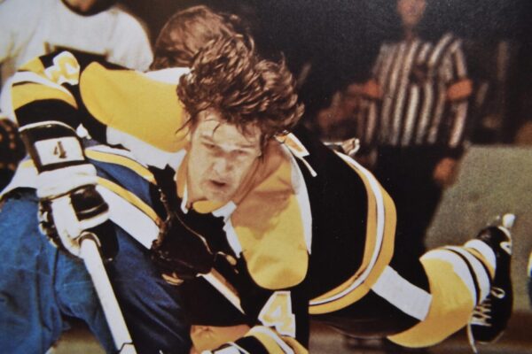 Hockey player with yellow and black jersey.