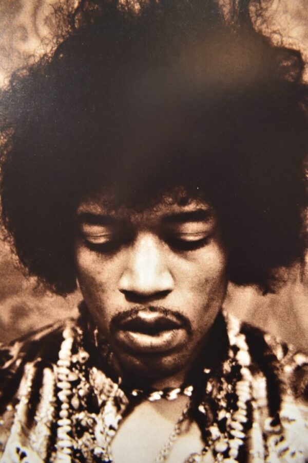 Close-up portrait of Jimi Hendrix.