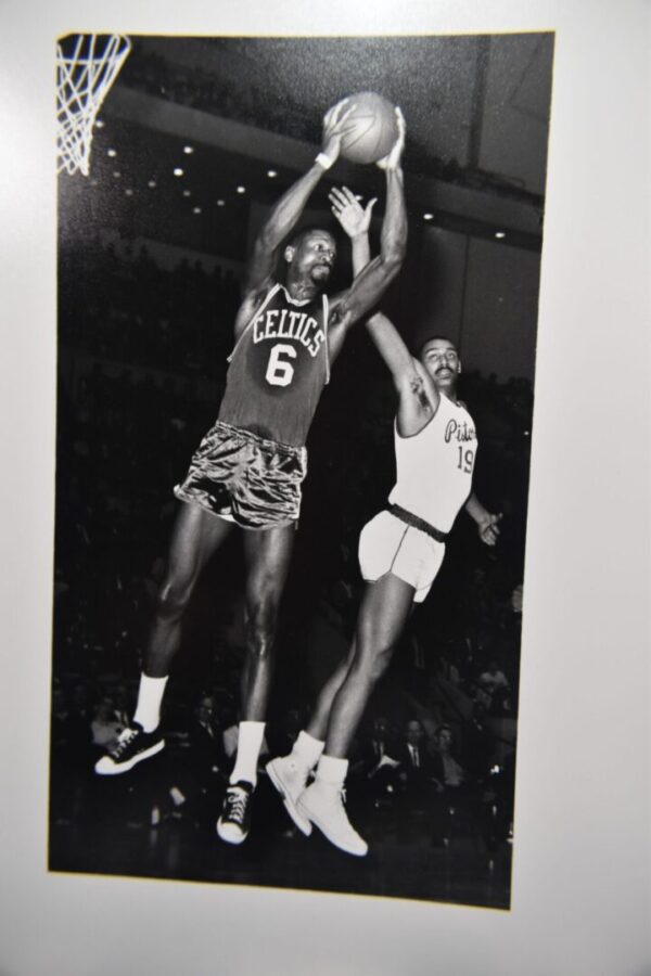 Black and white photo of two basketball players.