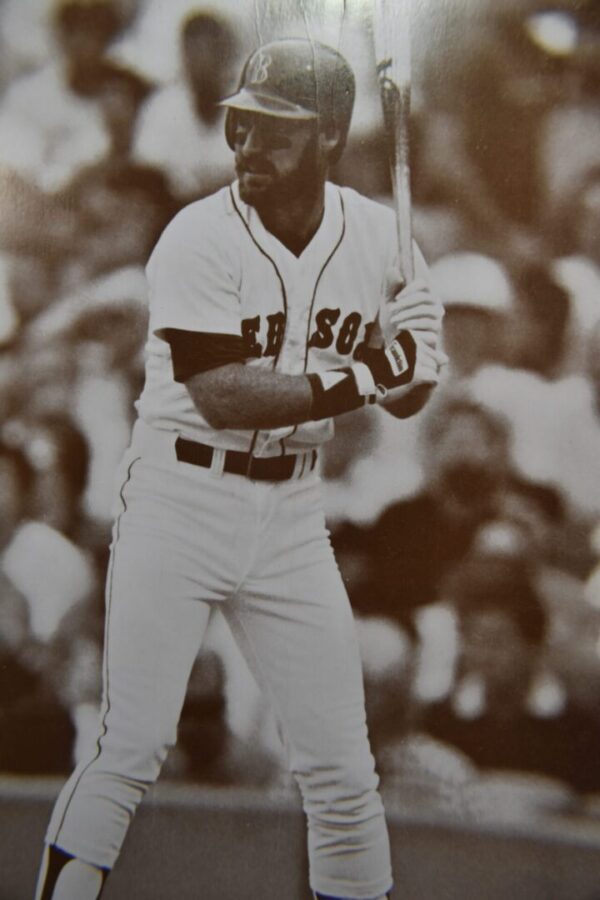 Baseball player at bat in black and white.