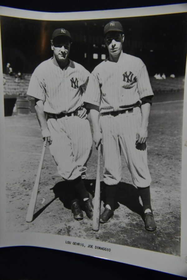 Lou Gehrig and Joe DiMaggio in Yankee uniforms.