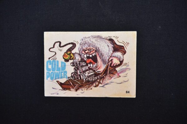 Monster driving a snowmobile with "Cold Power" logo.