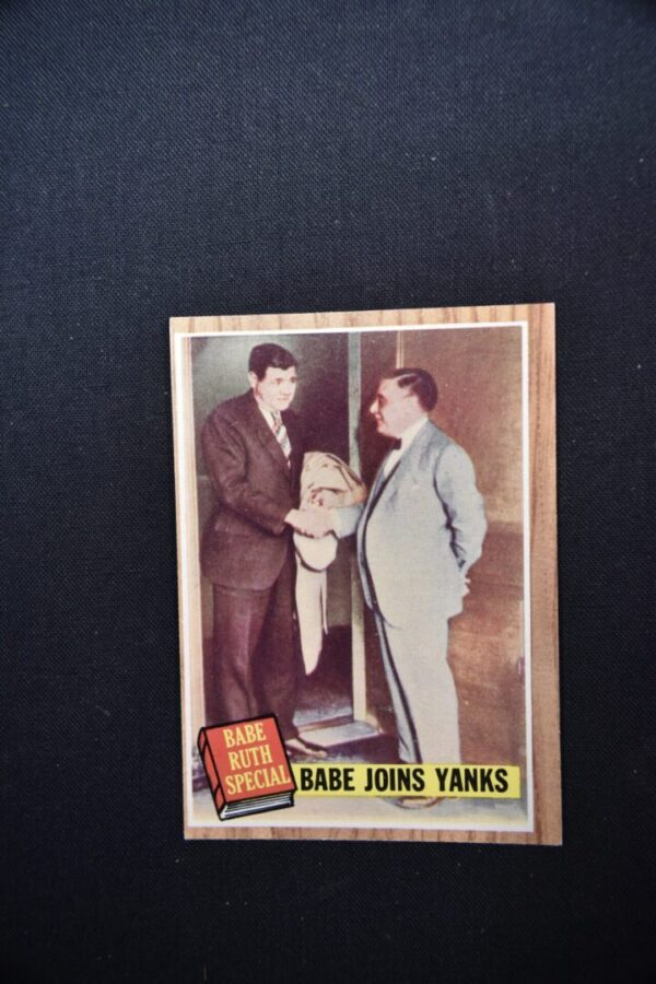 Babe Ruth baseball card, joins the Yankees.