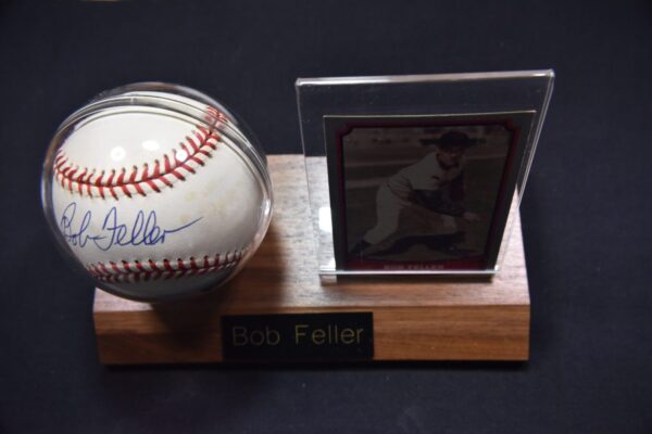 Signed Bob Feller baseball and card display.