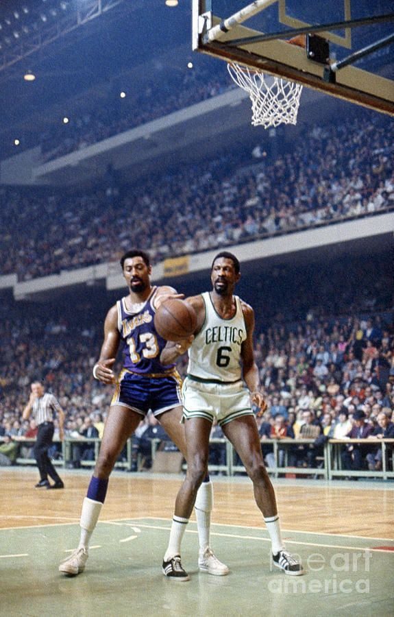 Two basketball players during a game.