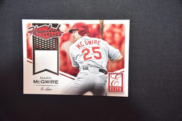 Mark McGwire baseball card, Elite throwback threads.